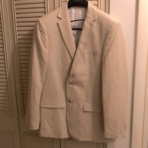 This a natural color suit blazer style for day or evening wear -